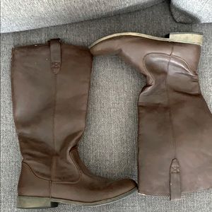 Tall brown riding boots